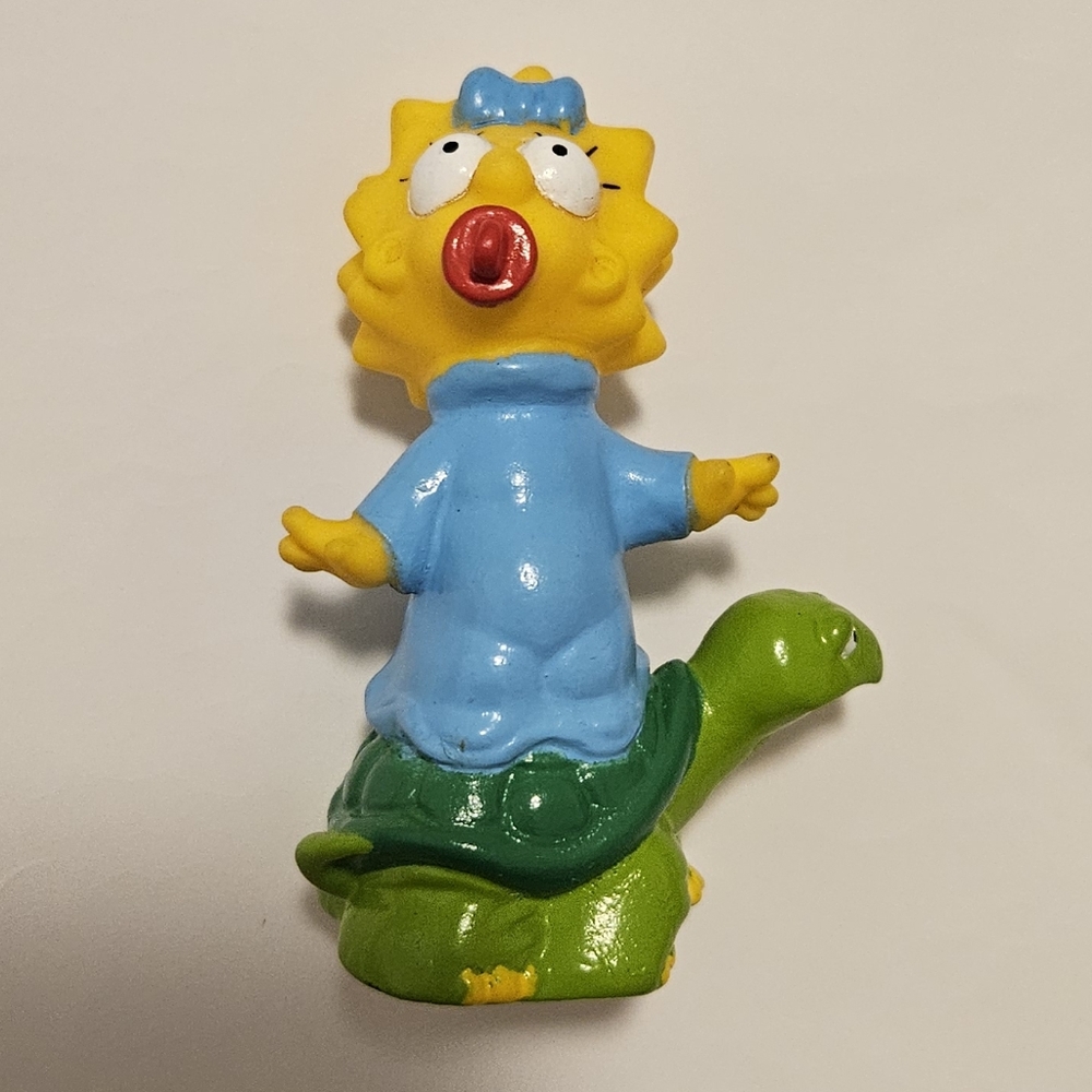 Blue and Green Kids Toy Figure